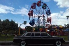 COSTA RICA FERRIS WHEEL. MERCEDES 300D AMUSEMENT PARK TRANSPORTATION